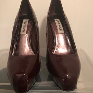 Oxblood patent leather pumps